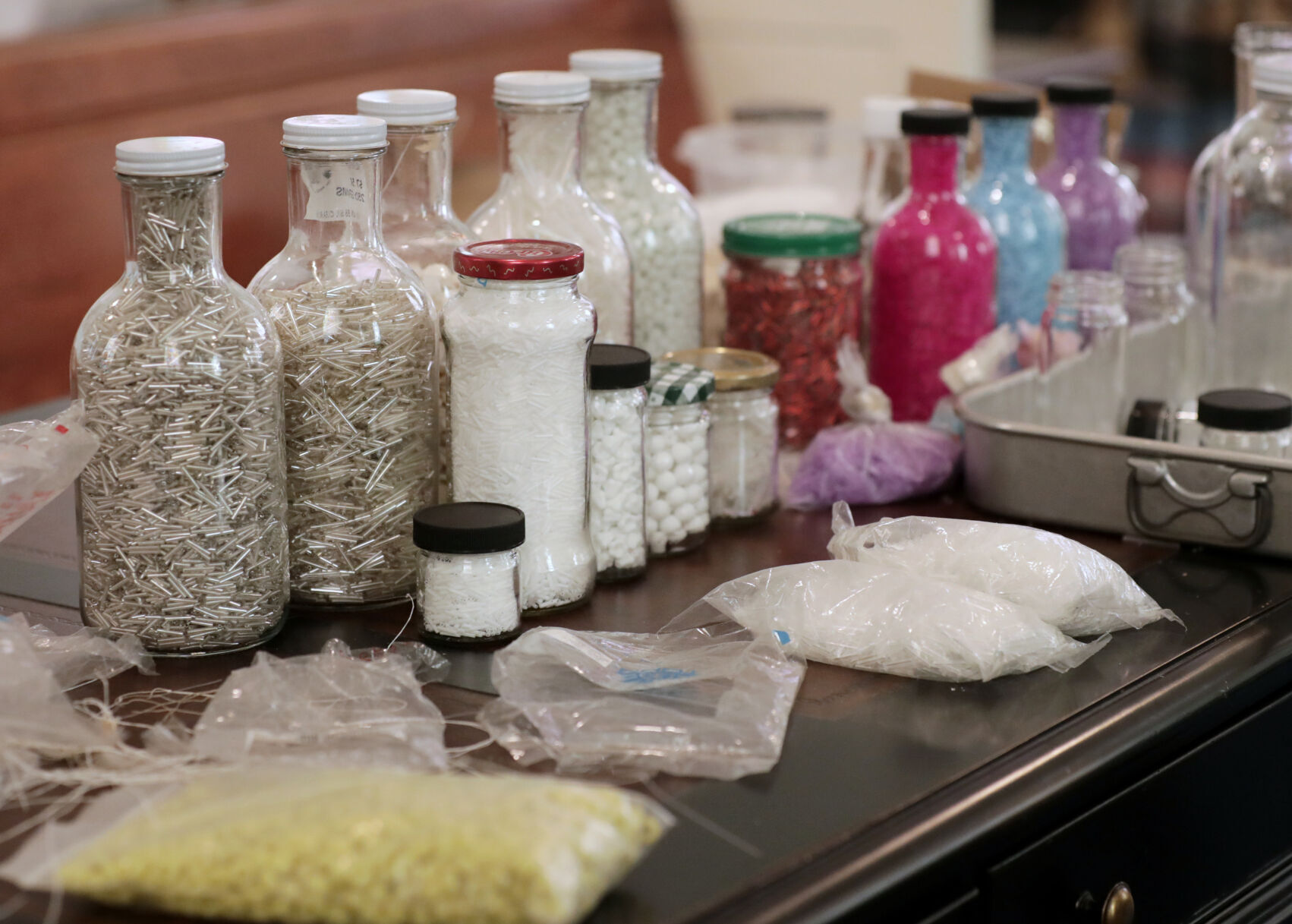 Containers of beads in Tom Jones' studio